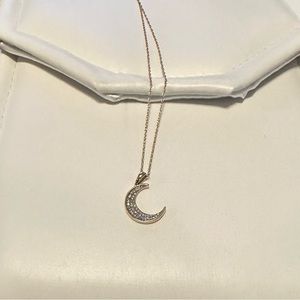 10k yellow gold and .06 ctw diamond moon pendant 18”